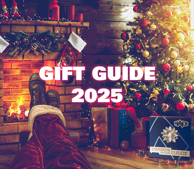 HAIX Gift Guide 2025 with XR1 Pro boots worn with santa pants by a fireplace, a christmas tree, and wrapped presents.